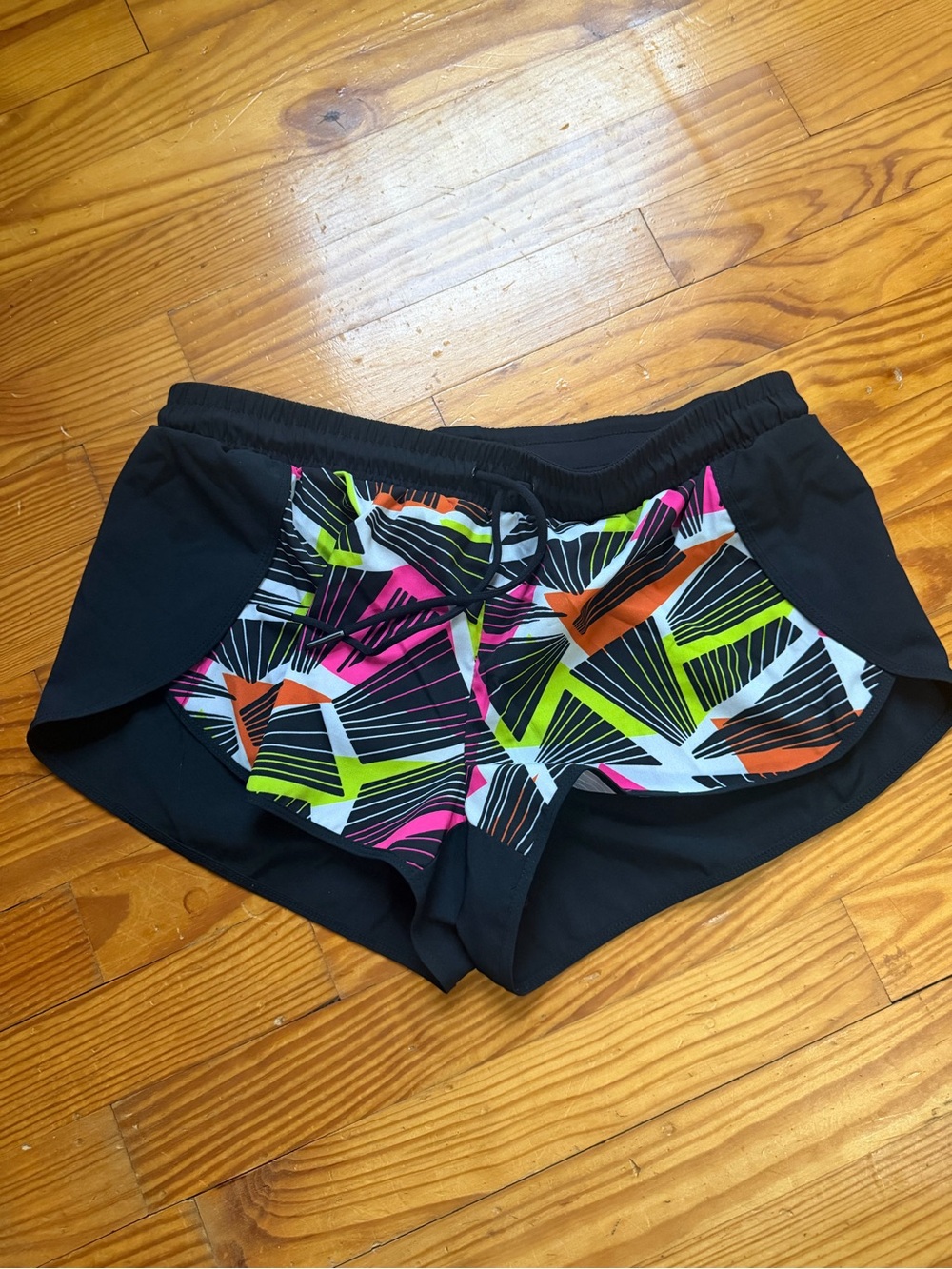 Women’s fabletics Black Active Shorts with Neon Geometric Panel